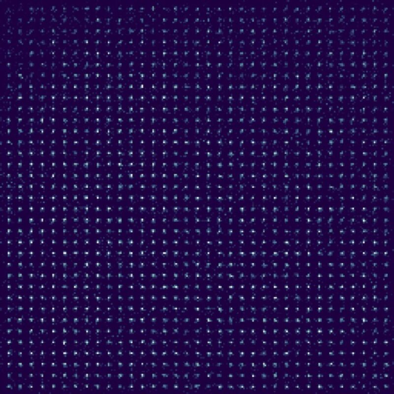 A dark blue background filled with a regular grid of lighter dots