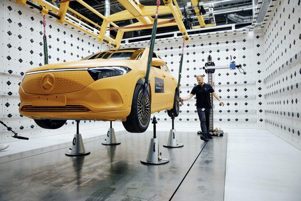 A Mercedes EQA electric car is prepared for a crash test.