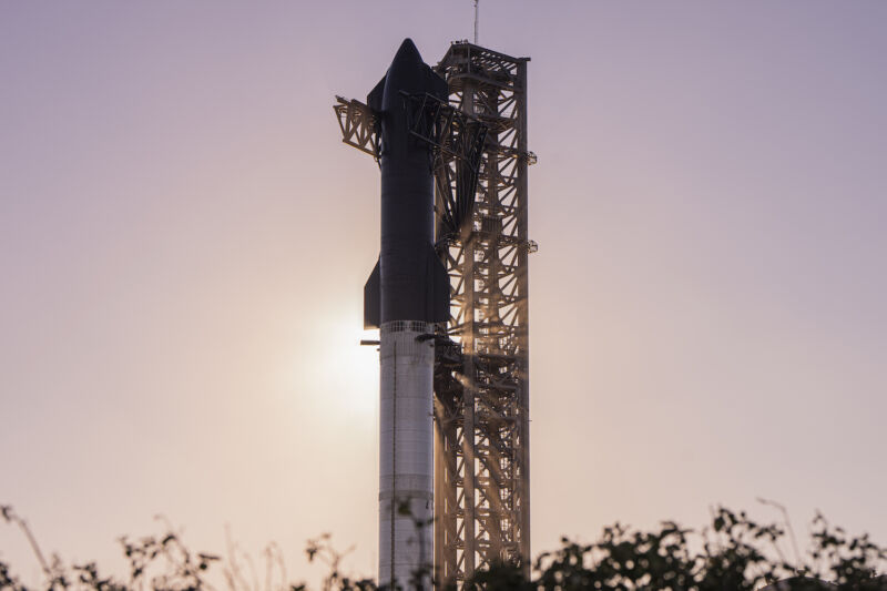 SpaceX's Starship rocket on a launch pad in Texas awaiting liftoff on a test flight.