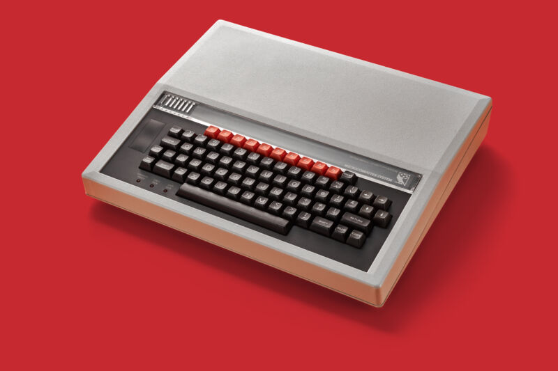 BBC Micro system, at medium distance, with full keyboard and case showing.