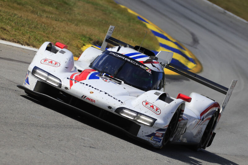 #59: Proton Competition, Porsche 963, GTP: Harry Tincknell, Gianmaria Bruni, Neel Jani races through Turn 12 during the 26th Annual Petit Le Mans race on October 14, 2023 at Michelin Raceway Road Atlanta in Braselton, Georgia.