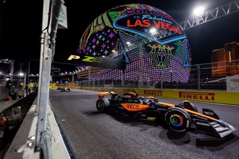 McLaren driver Oscar Piastri (81) of Australia drives by the Sphere during the F1 Las Vegas Grand Prix on Saturday, November 18, 2023 on the Las Vegas Street Circuit in Las Vegas, NV.