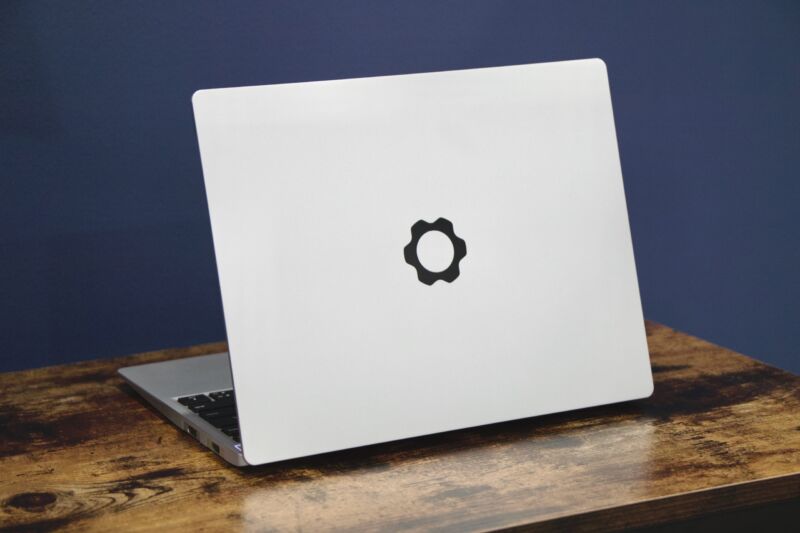 The Framework Laptop 13, with Framework's gear logo on the lid.