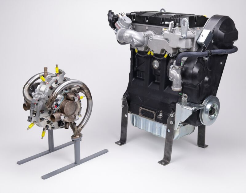 A small rotary engine next to a conventional-size 25 hp piston engine