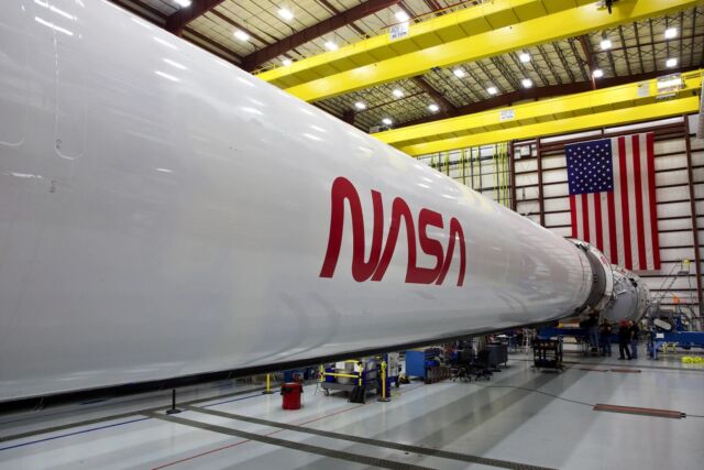 This Falcon 9 started off with a coat of bright white paint. It now shows the soot markings from 17 trips to space.