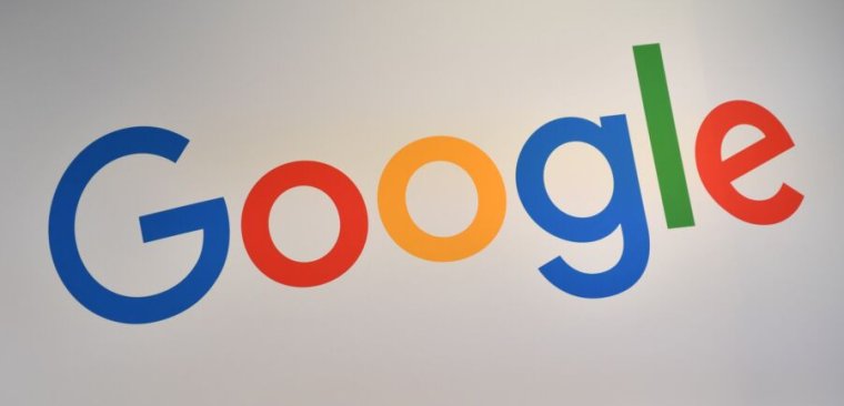 A large Google logo at a trade fair.