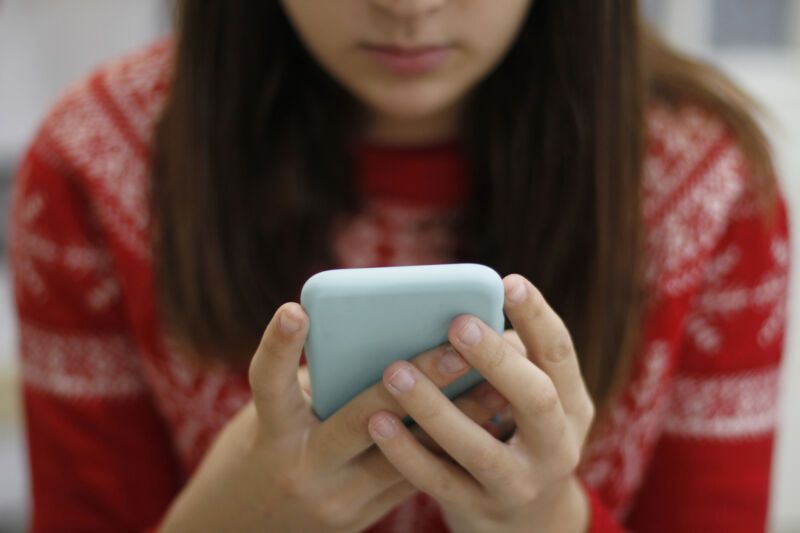 young woman using smartphone