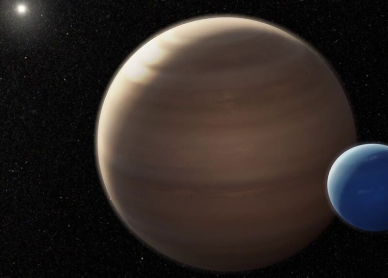 Image of two planets orbiting together around a distant star.