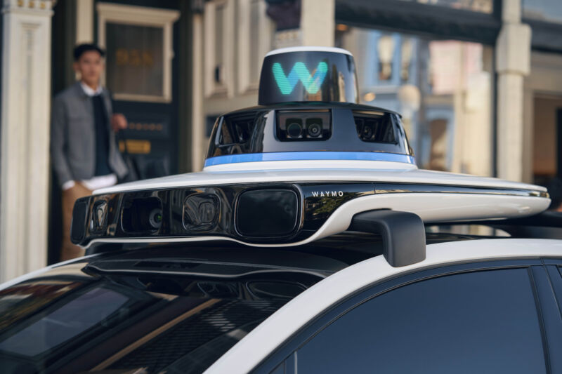 Sensors on top of a Waymo car.