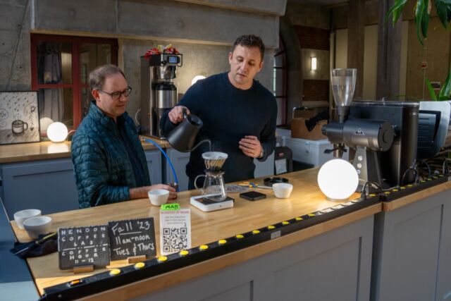 Josef Dufek and Christopher Hendon prepare filter coffee in the Oregon Coffee Laboratory.