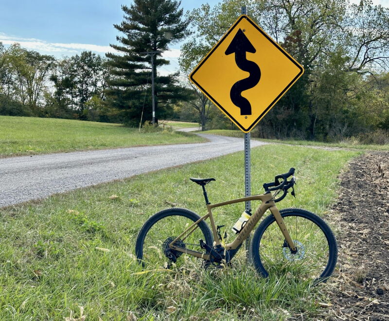 Bike leaning against a sign
