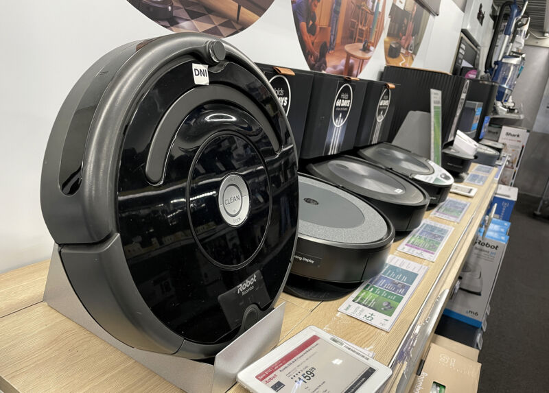 Roomba models on display in a store