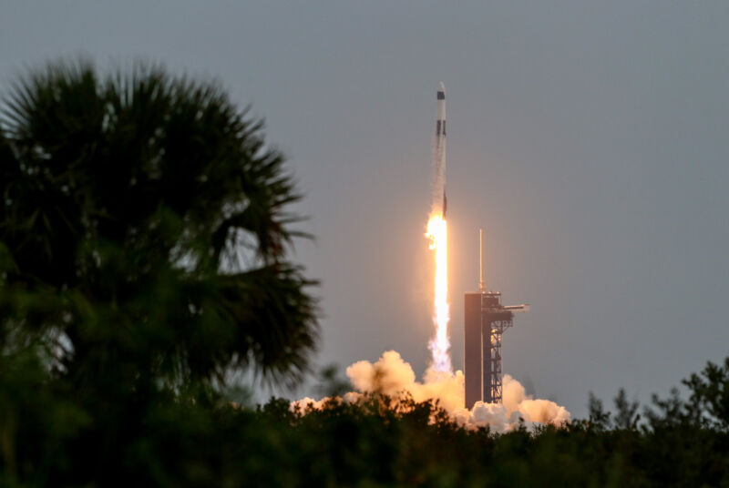 A Falcon 9 rocket lifts off from NASA's Kennedy Space Center to begin the Ax-3 commercial crew mission.