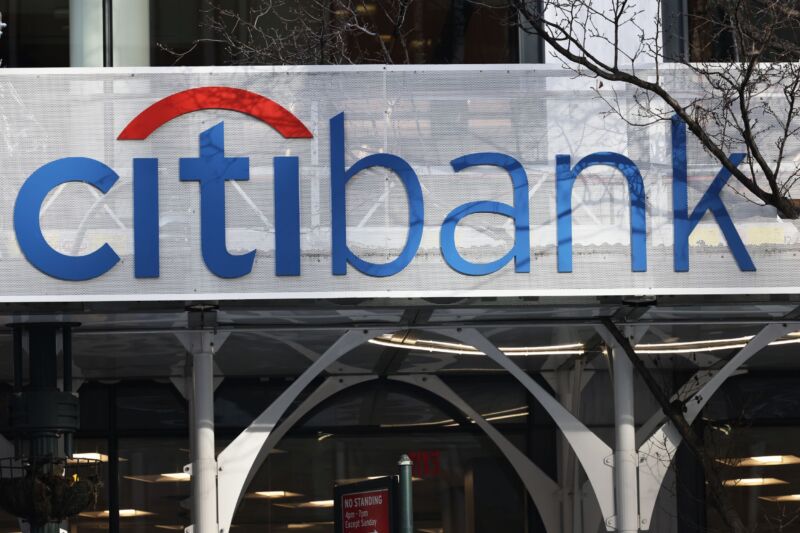 A large Citibank logo on the outside of a bank building.