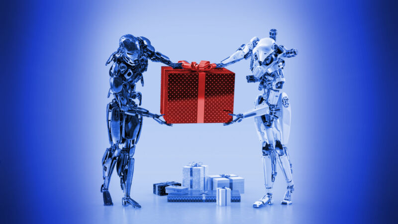 Two robots hold a gift box.