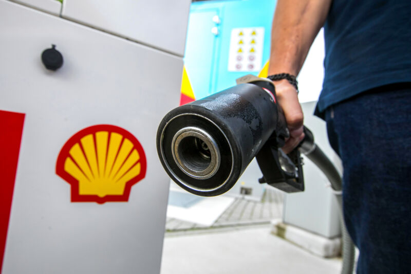 An employee handles a pump at a hydrogen refueling point at a Royal Dutch Shell Plc gas station in Berlin, Germany, on Wednesday, Aug. 25, 2021.
