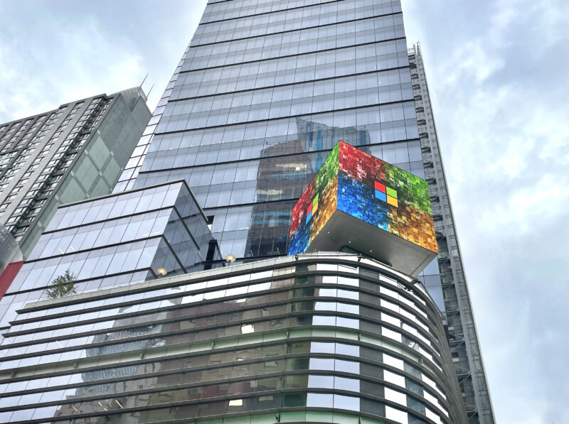 Cube with Microsoft logo on top of their office building on 8th Avenue and 42nd Street near Times Square in New York City.