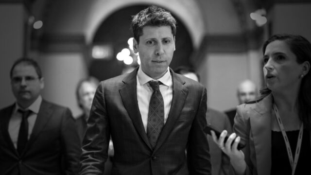 OpenAI CEO Sam Altman walks across the side of the House of Representatives at the U.S. Capitol in Washington, DC on January 11, 2024.