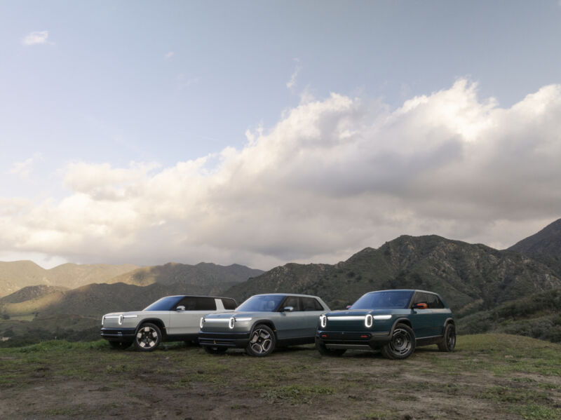 Rivian R2, R3, and R3X SUVs parked together
