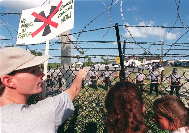 US Air Force security personnel at Cape Canaveral, Florida, formed a line to thwart protesters before the launch of NASA's Cassini spacecraft in October 1997.