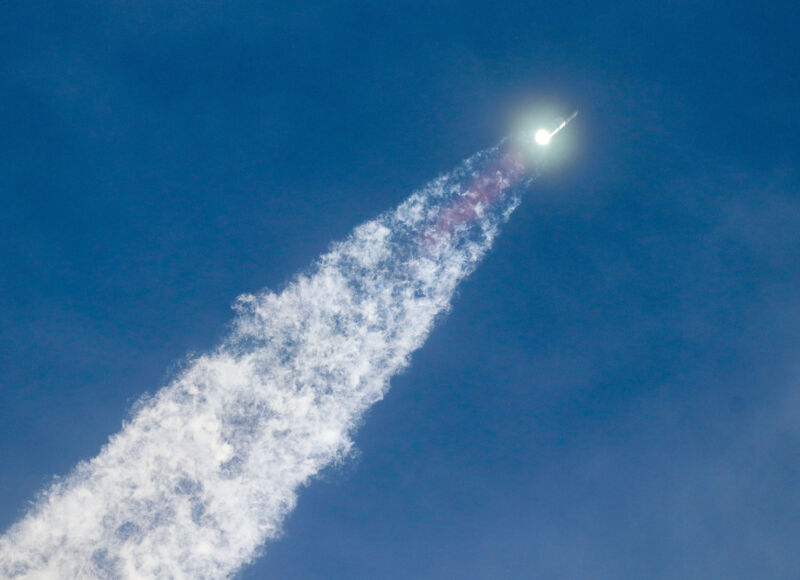 SpaceX's Starship soars through the sky over South Texas, powered by 33 methane-burning Raptor engines.