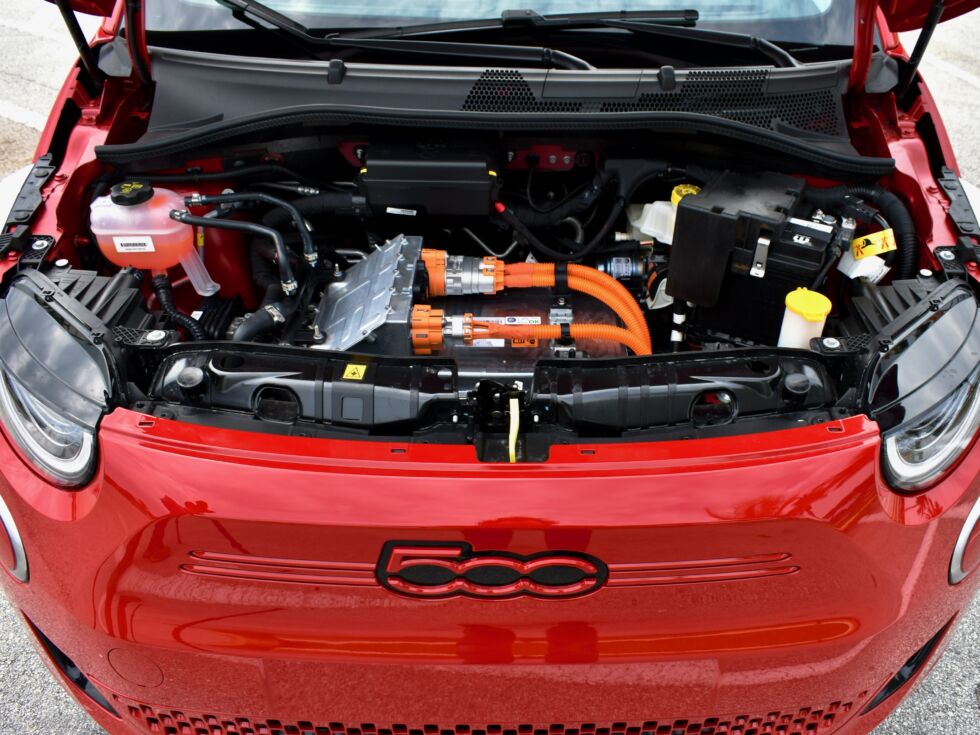 The engine bay is home to power electronics and HVAC machinery.