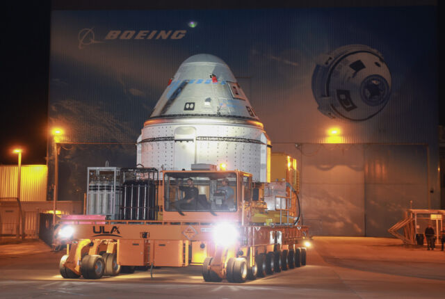 Boeing's Starliner spacecraft rolls out of the Commercial Crew and Cargo Processing Facility at NASA's Kennedy Space Center, heading to ULA's Atlas V rocket hangar. (Photo by Joe Raedle/Getty Images)