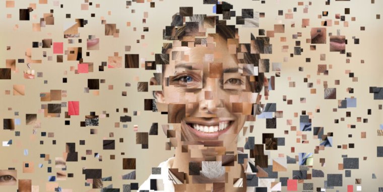 A face made up of many pixelated squares joined together