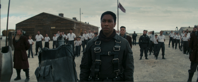 A man stands in a military base
