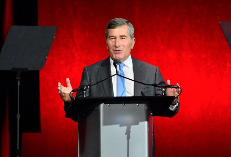 Motion Picture Association CEO Charles Rivkin gives a speech at a podium during a conference.