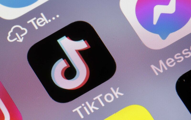 A TikTok app icon on a phone screen.