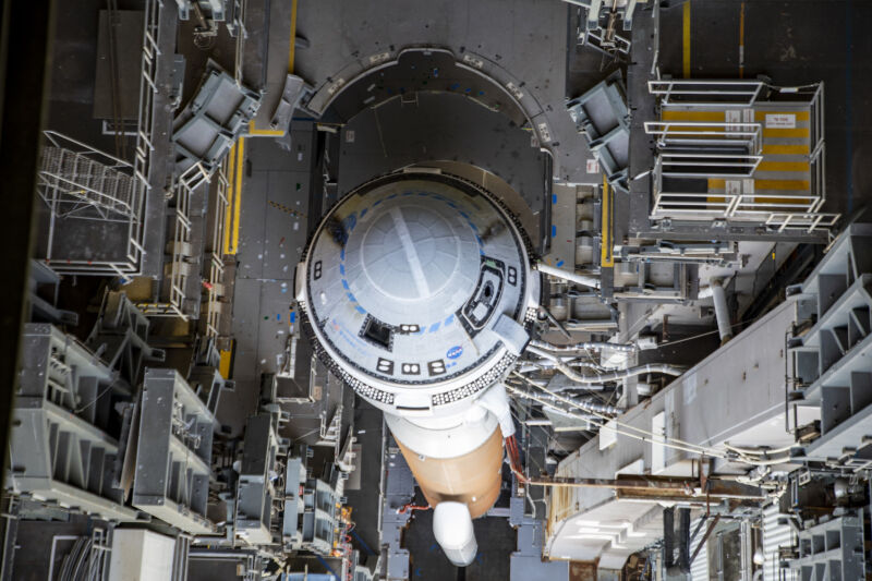 A view looking down at Boeing's Starliner spacecraft and United Launch Alliance's Atlas V rocket inside the Vertical Integration Facility at Cape Canaveral Space Force Station, Florida.