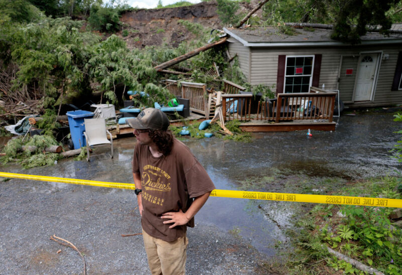Ripton, VT - July 16, 2023: Ethan Poploski stood in front of his family's home, which had been destroyed by a landslide overnight. 