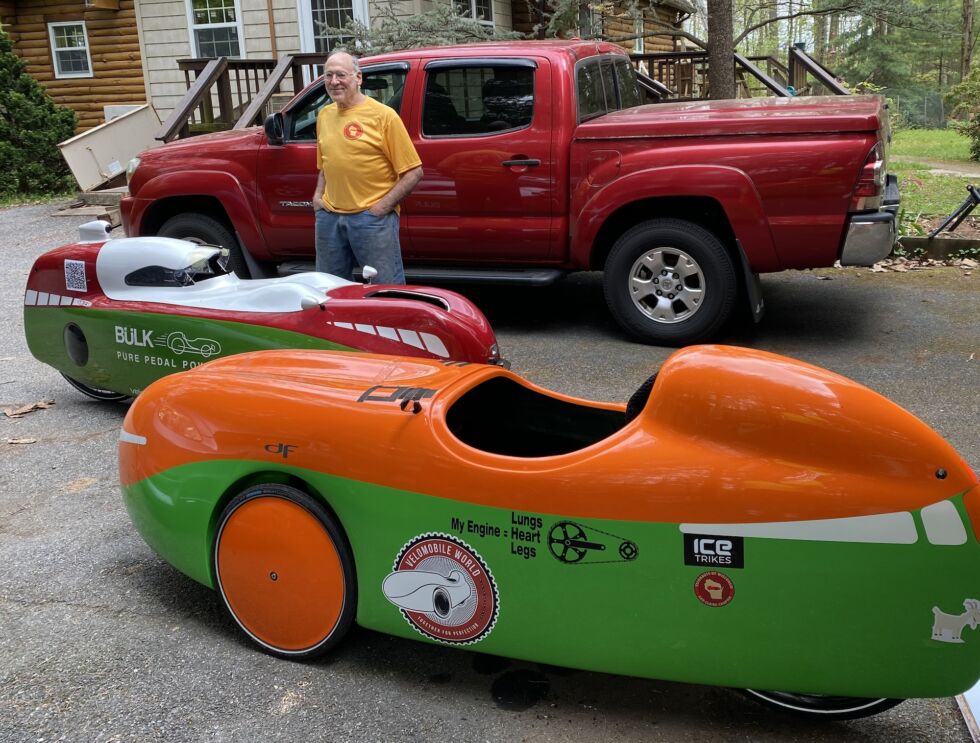 Marc Rosen and two of his velomobiles. The newer model, the Bülk, is closer to him.
