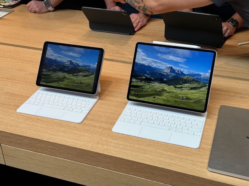 Apple's latest iPad Air, now in two sizes. The Magic Keyboard accessory is the same one that you use with older iPad Airs and Pros, though they can use the new Apple Pencil Pro.