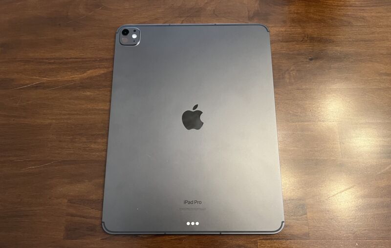The back of an iPad with its Apple logo centered