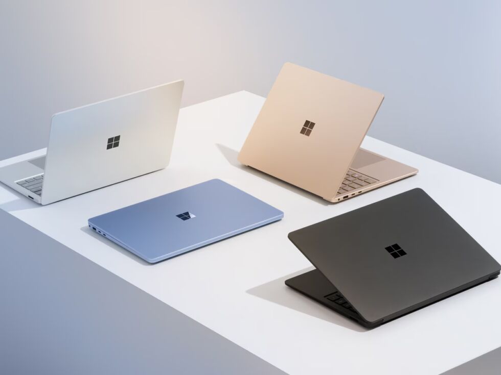Various Surface Laptops in the four available color finishes.
