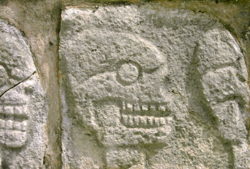 Detail from the reconstructed stone tzompantli, or skull rack, at Chichén Itzá.
