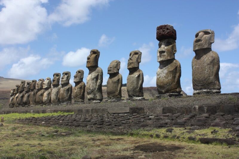 statues on easter island arranged in a horizontal row