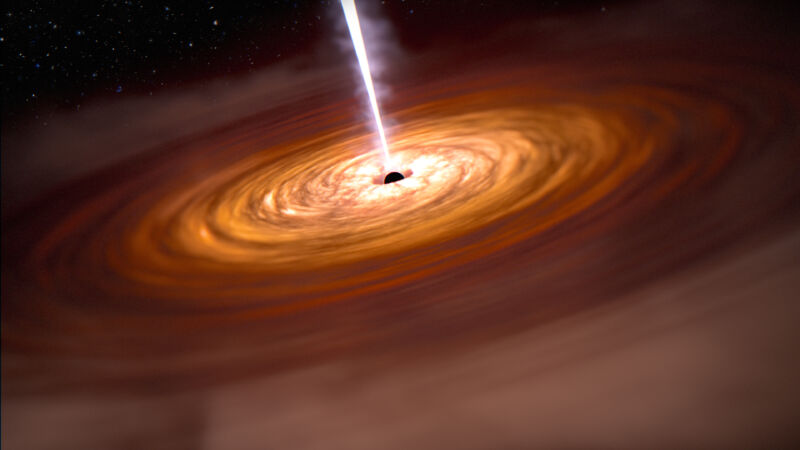 Image of a glowing disk with a bright line coming out of its center.