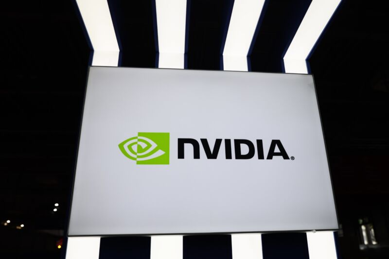 A large Nvidia logo at a conference hall