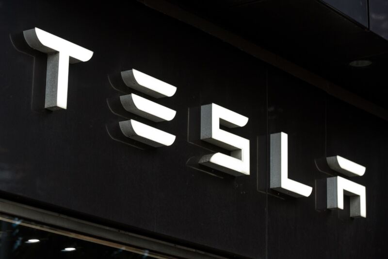 A large Tesla logo
