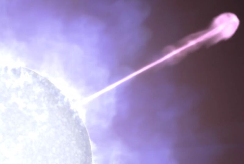 A jet of particles moving at nearly light speed emerges from a massive star in this artist’s concept.
