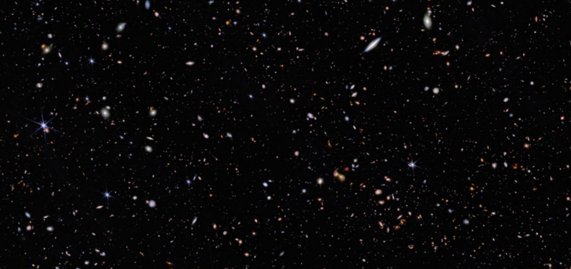 Image of a field of stars and galaxies.