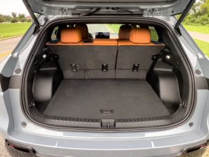 A Honda Prologue in profile in a park.