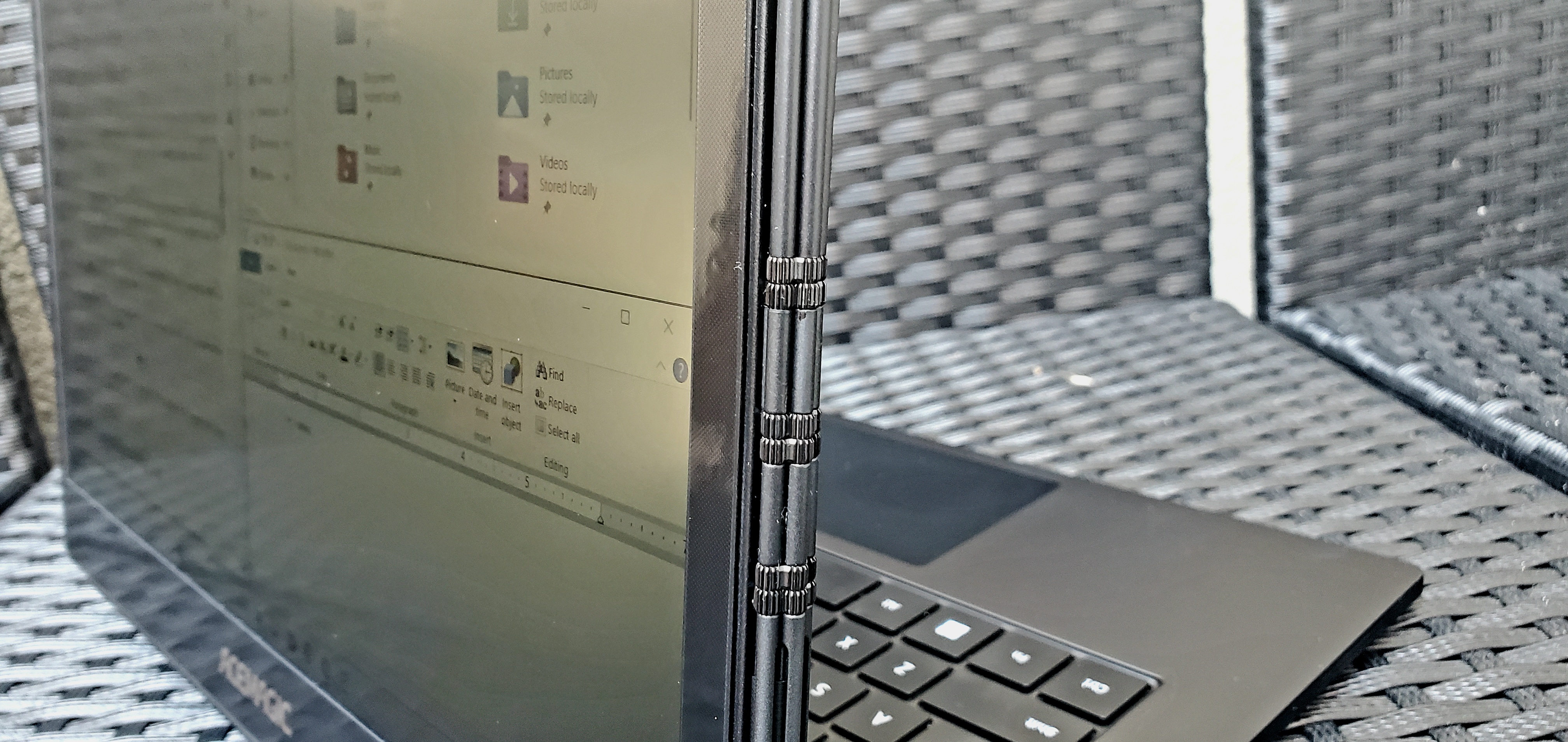 Dual-screen laptops make more sense with this spiral notebook-like hinge