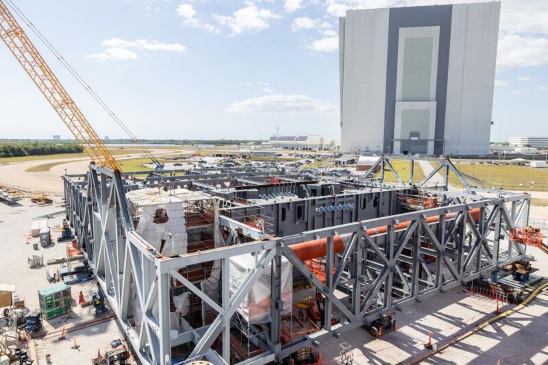 Teams from NASA's Exploration Ground Systems Program and prime contractor Bechtel National, Inc. continue construction on the base of the platform for the new mobile launch vehicle at the Kennedy Space Center in Florida on Wednesday, April 24, 2024.