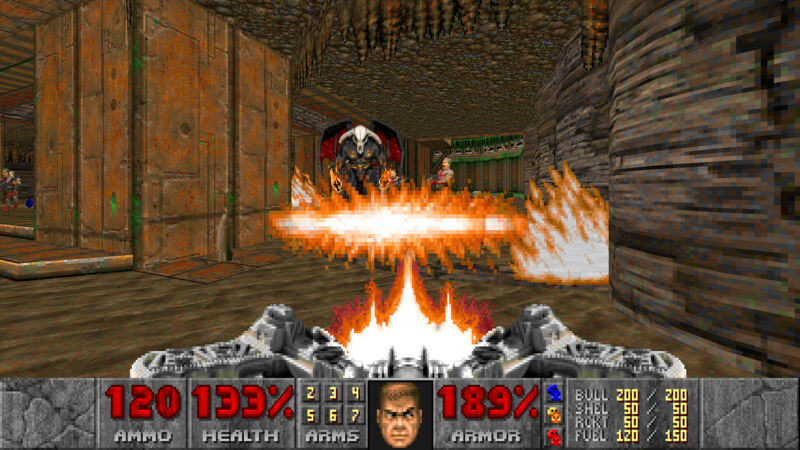 Some kind of huge gun, laying waste to a bunch of demons in a brown-ish Doom level from Legacy of Rust