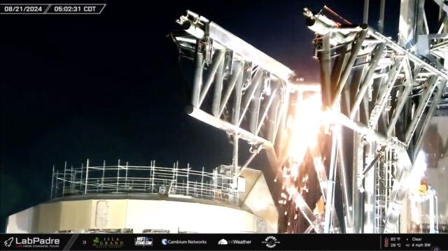 Sparks fly at the starbase as welders work all night on the spaceship's launch pad.