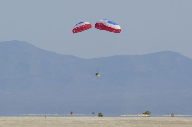 Boeing's Starliner spacecraft descends toward landing at White Sands Space Harbor, New Mexico, on an uncrewed test flight in May 2022.